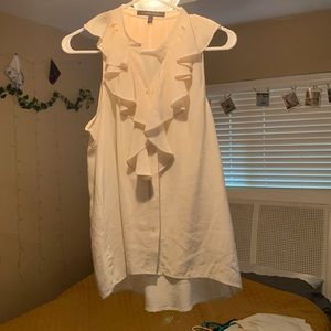 Off white sleeveless blouse